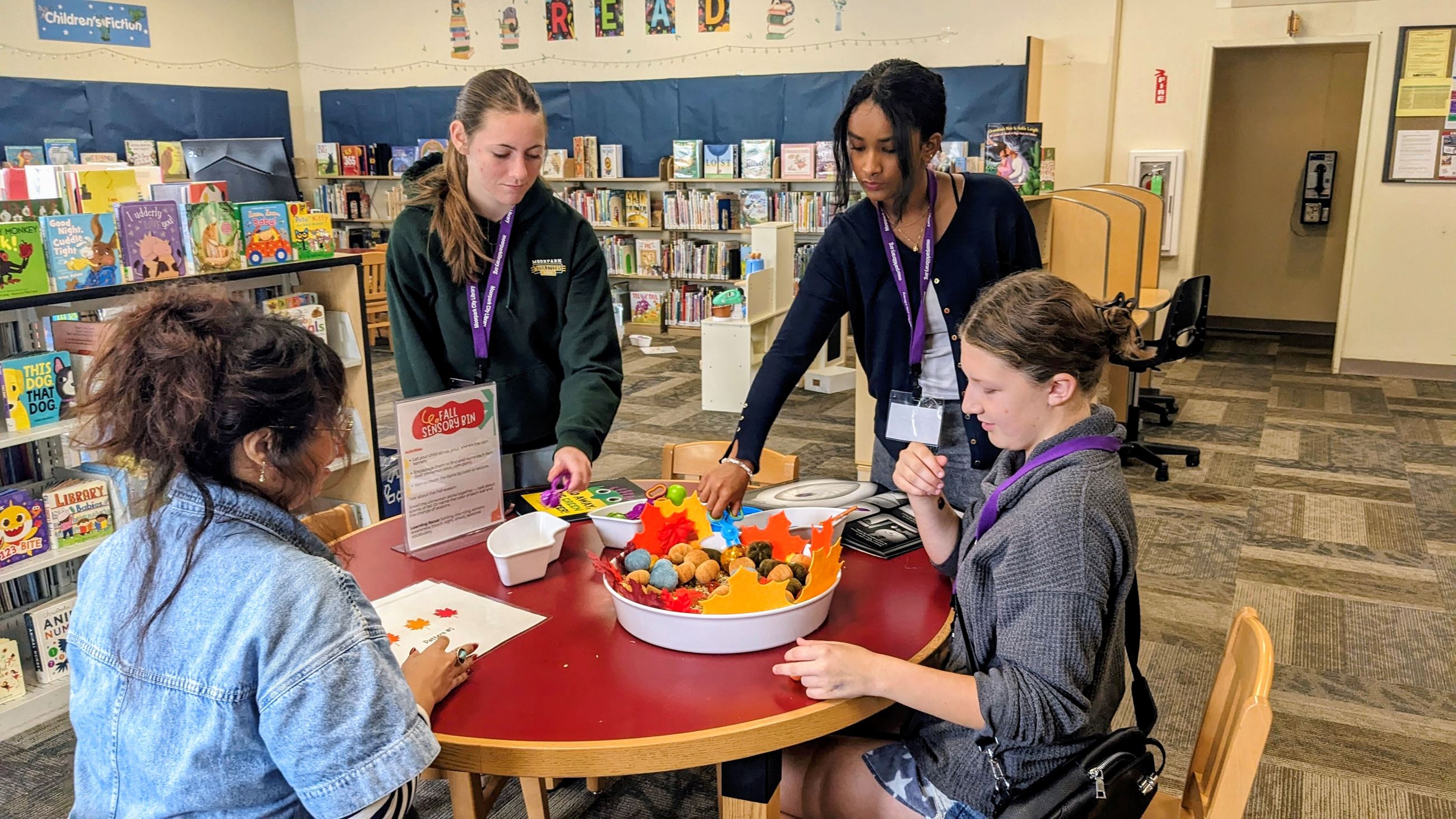 Teen volunteer sensory storytime